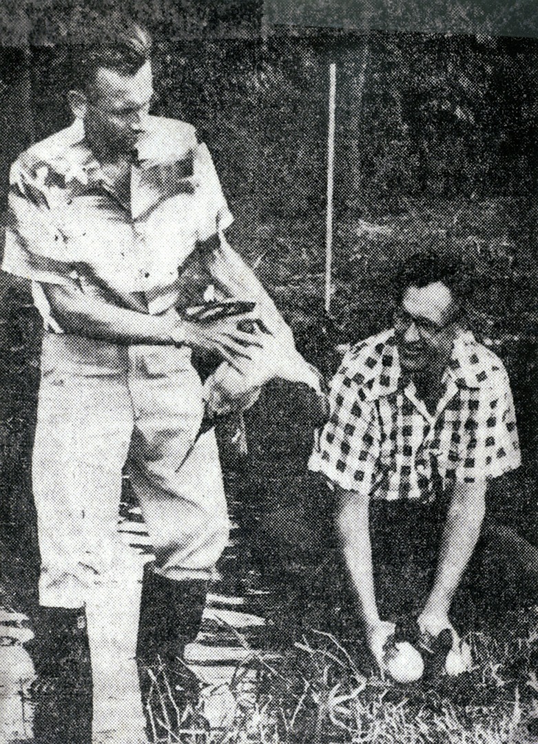 Paul Breese & Director of Fish & Game Vernon Brock inspecting waterfowl, 1950