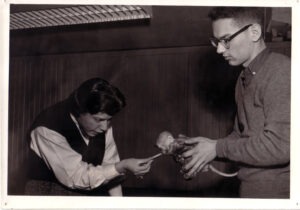 Zoologist Don Nickon with baby monkey